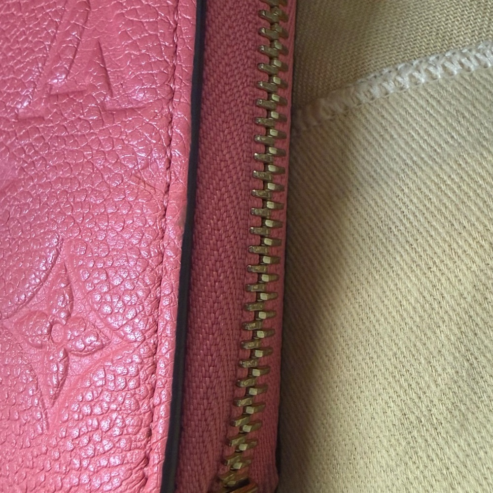 Authenticated Louis Vuitton Pink/Coral Monogram Empreinte Zippy Leather Wallet - Picture 6 of 16